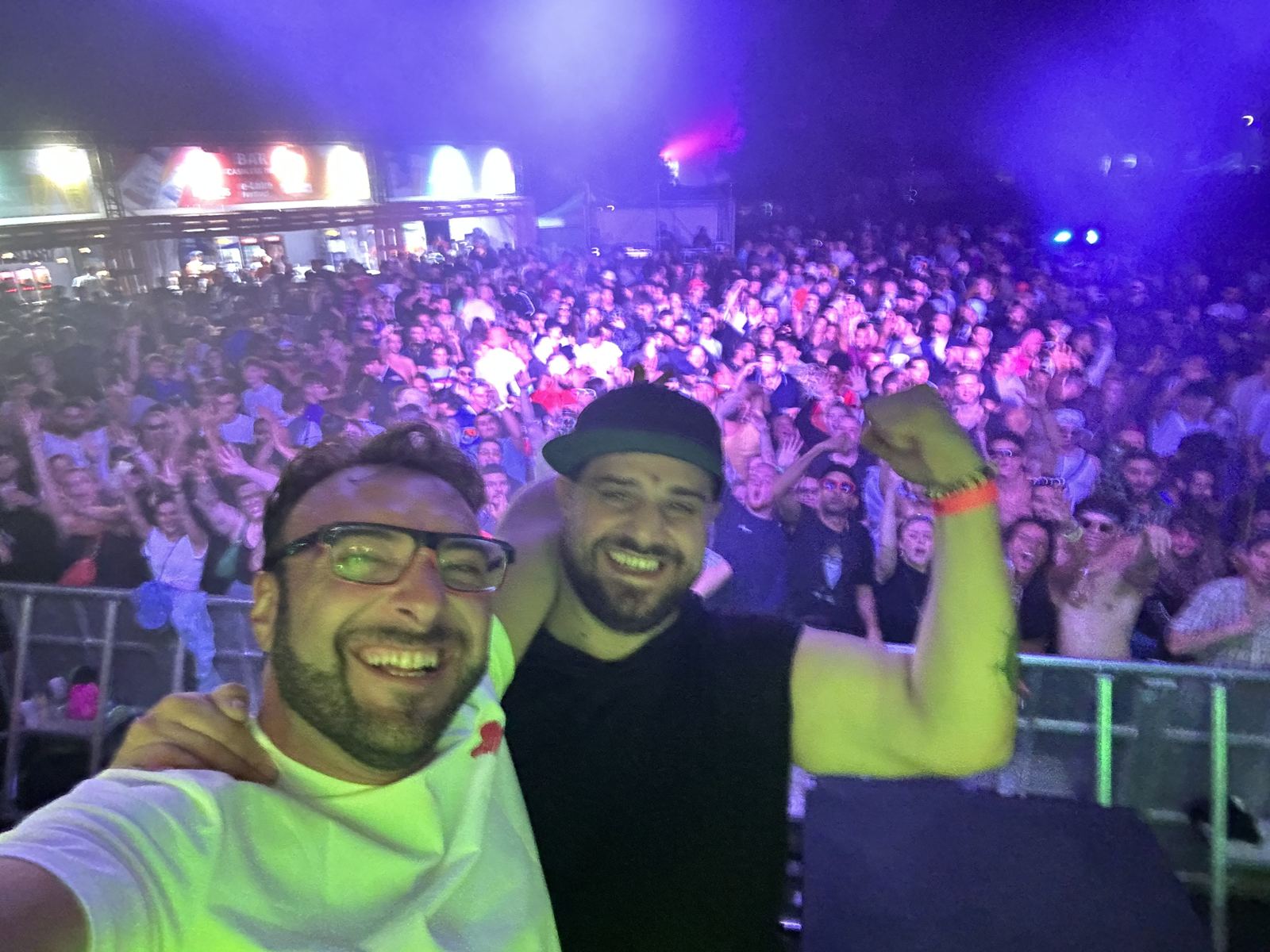 Mark Netty and Hugo in front of a festival crowd